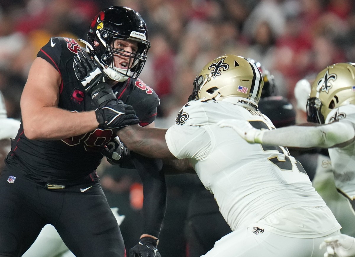 Arizona Cardinals defensive end J.J. Watt (99) tries to get past New Orleans Saints guard Cesar Ruiz (51) at State Farm Stadium. Mandatory Credit: Joe Rondone-Arizona Republic